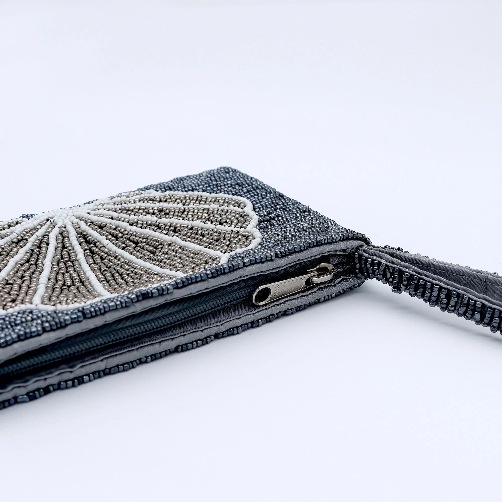 Handcrafted Beaded Pouch with Shell Design